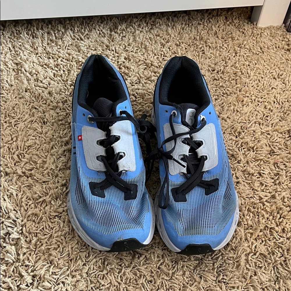On Running Blue and Black Athletic Shoes